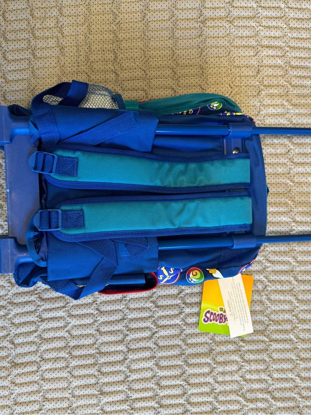 Vintage Scooby-Doo rolling backpack features a pilot graphic of Scooby-Doo